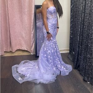 Size 2 , Purple beaded prom dress . Only worn once and is in great condition.